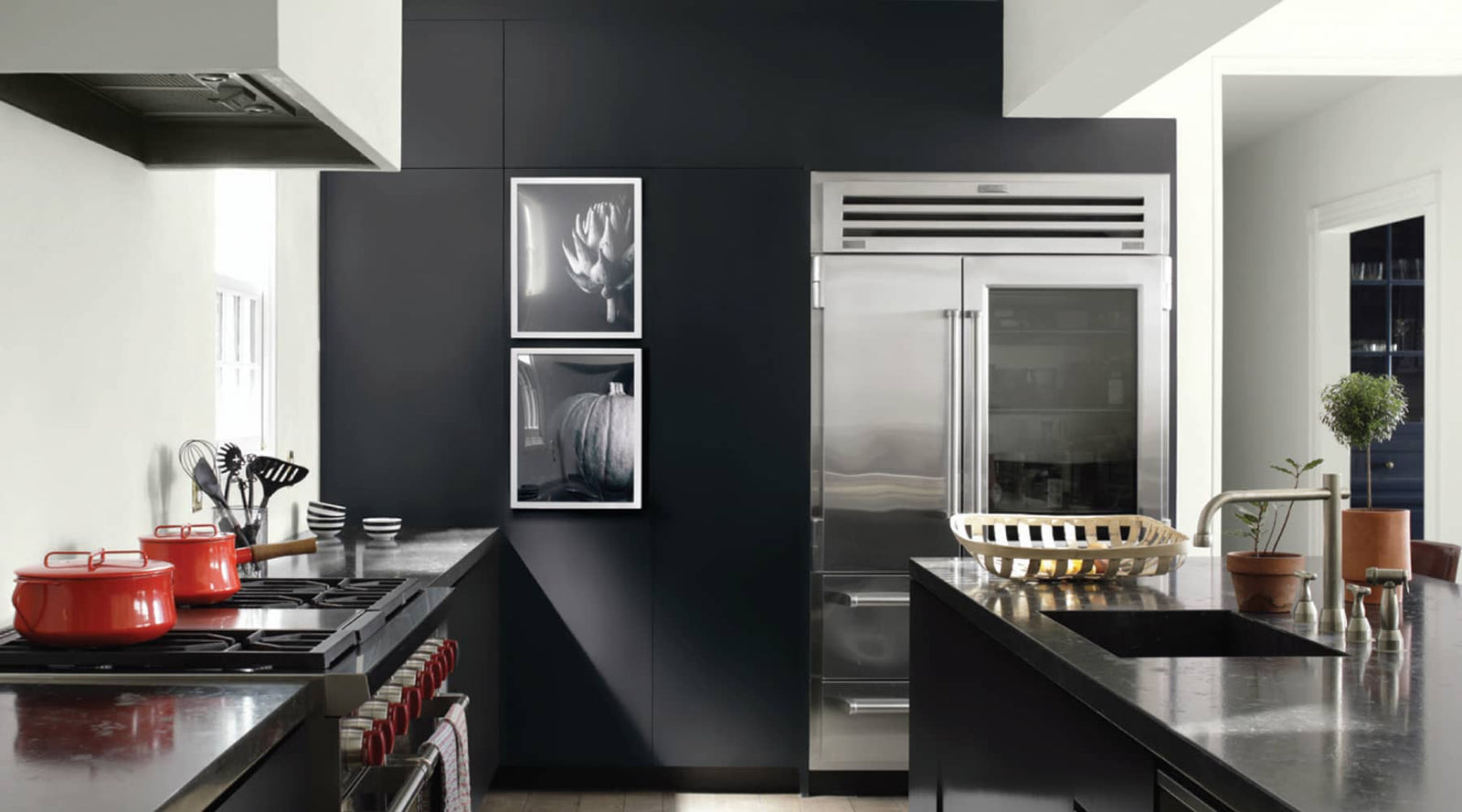 A kitchen painted with Benjamin Moore's 2126-10 Black Tar paint color, available at Clement's Paint in Austin, TX.