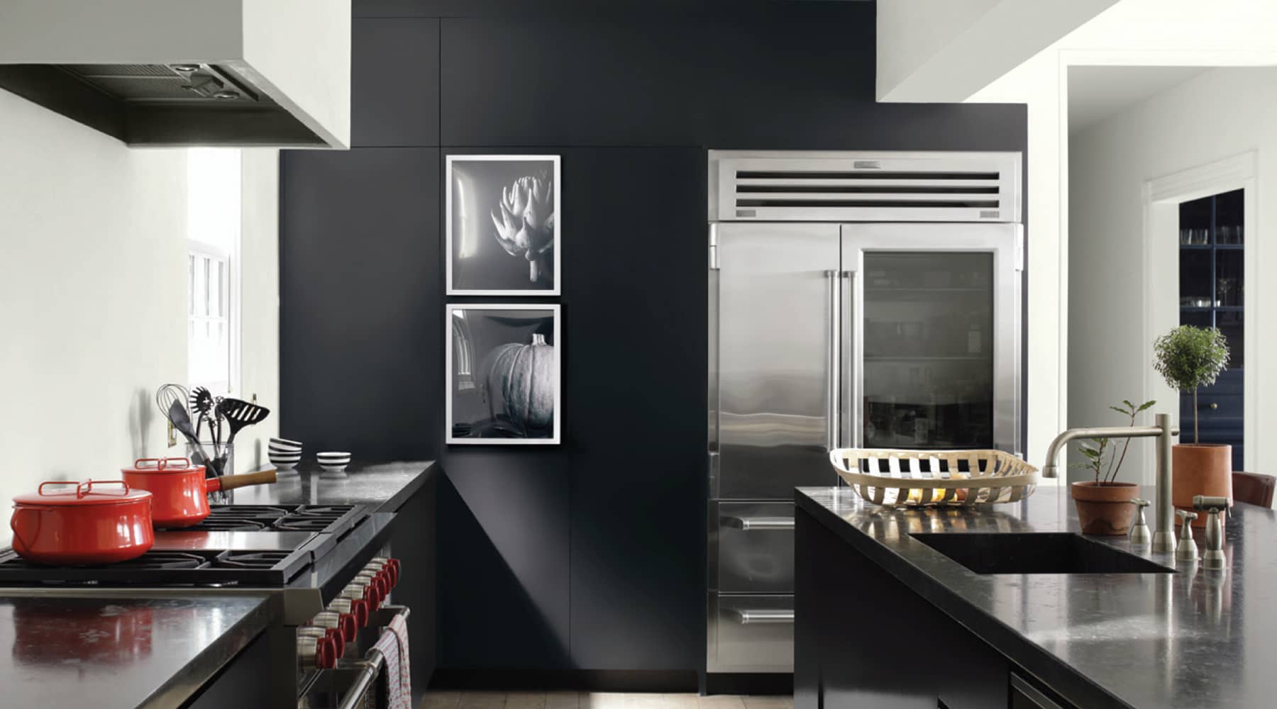 A kitchen painted with Benjamin Moore's 2126-10 Black Tar paint color, available at Clement's Paint in Austin, TX. 