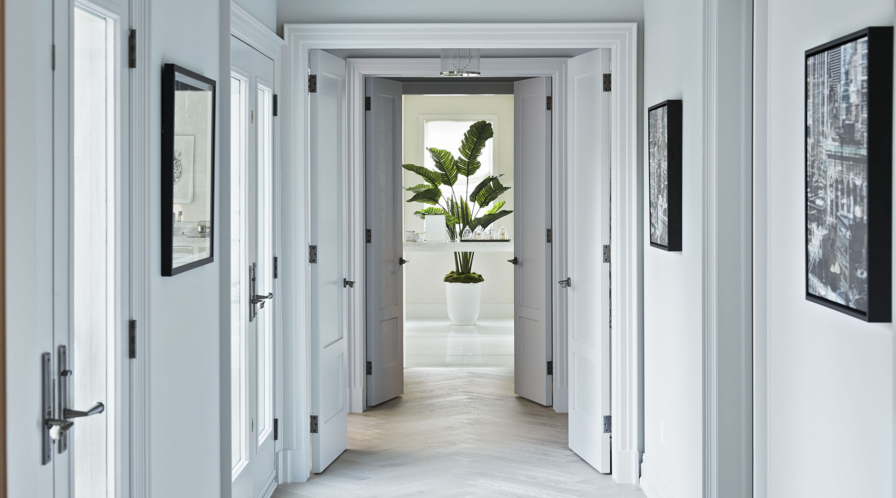 A hallway that has been painted with Benjamin Moore's Stonington Gray HC-170 paint color available at Clement's Paint in Austin, TX.