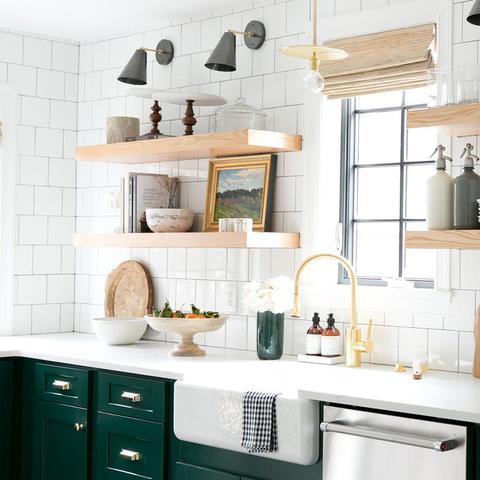 Kitchen cabinets painted with Benjamin Moore's Forest Green, available at Clement's Paint in Austin, Texas.